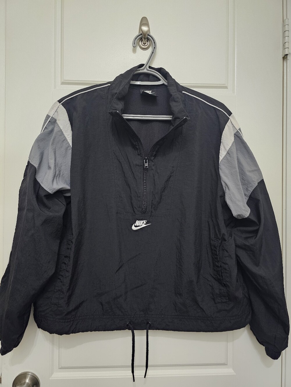 Nike Black Windbreaker with Gray Sleeve Panels Size S.